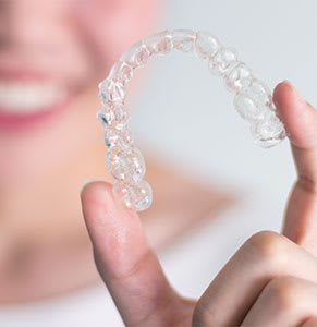 Pick up your aligners | West Market Dental | Calgary Dentist