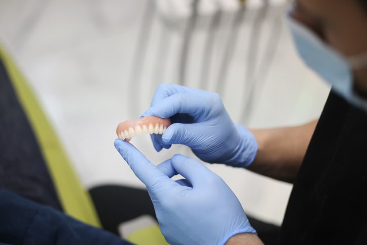 What are dentures?